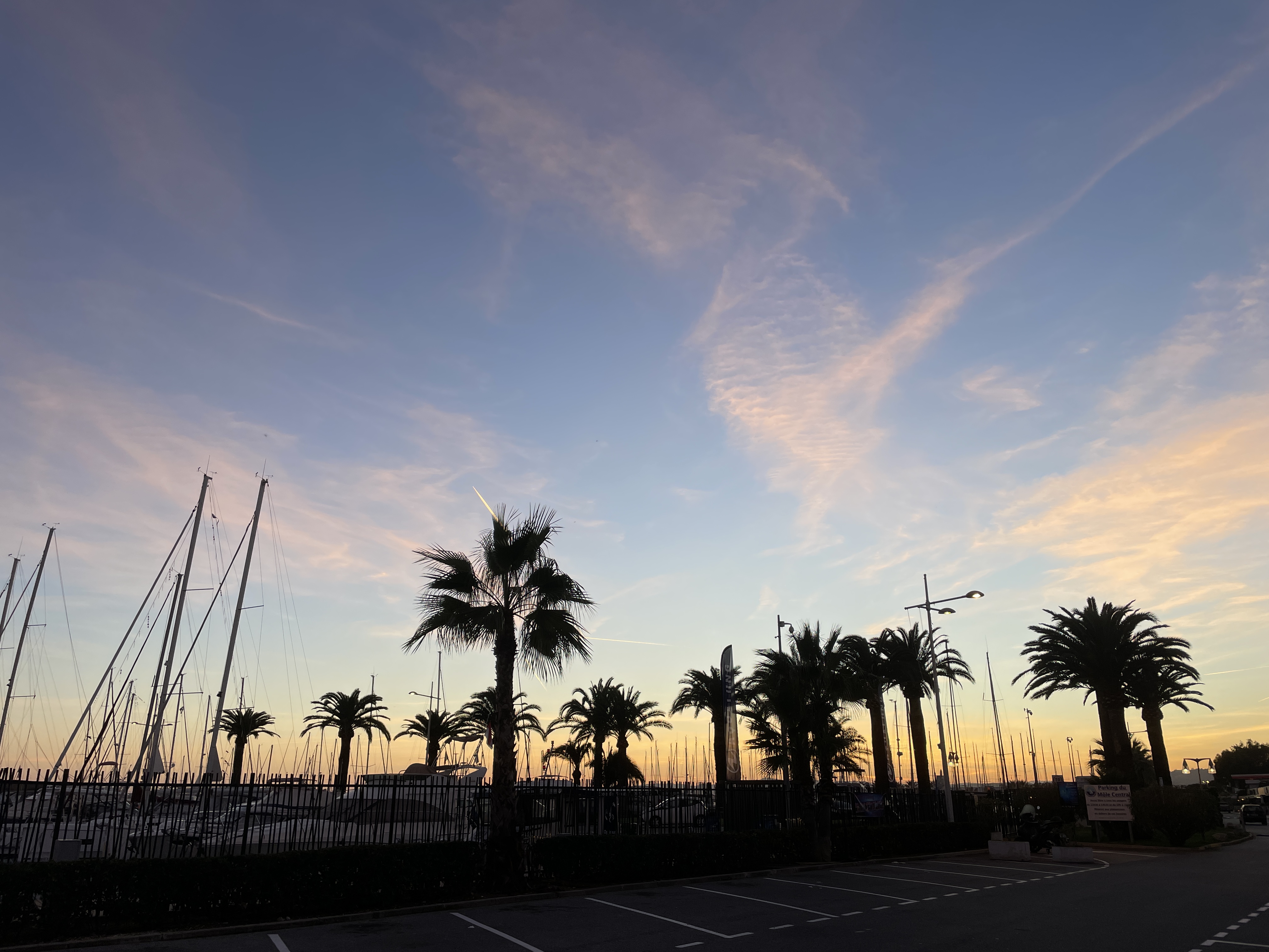 Èze village at sunset with golden light over Mediterranean Sea