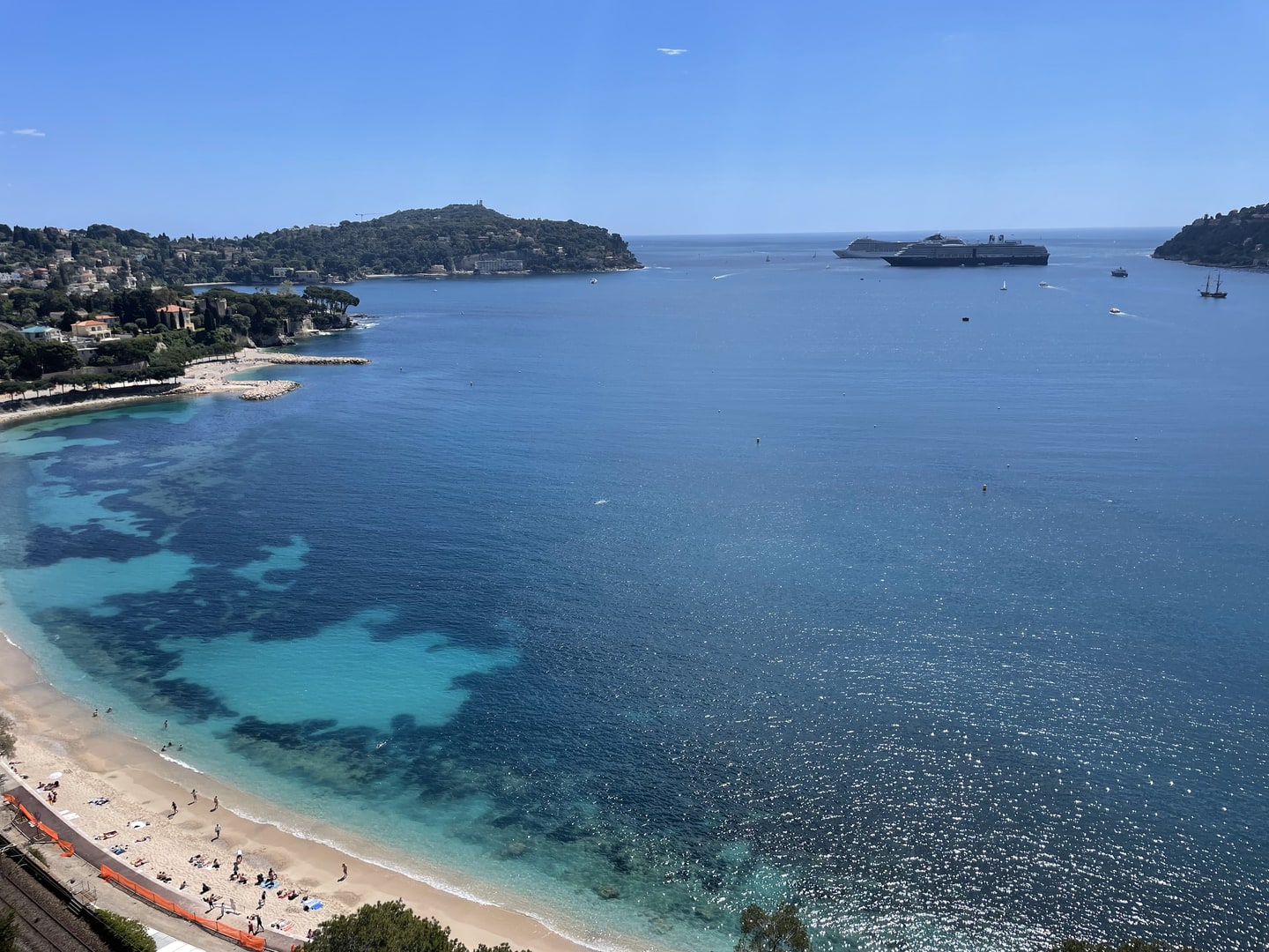 Turquoise shallows and sheltered coastline of Villefranche-sur-Mer