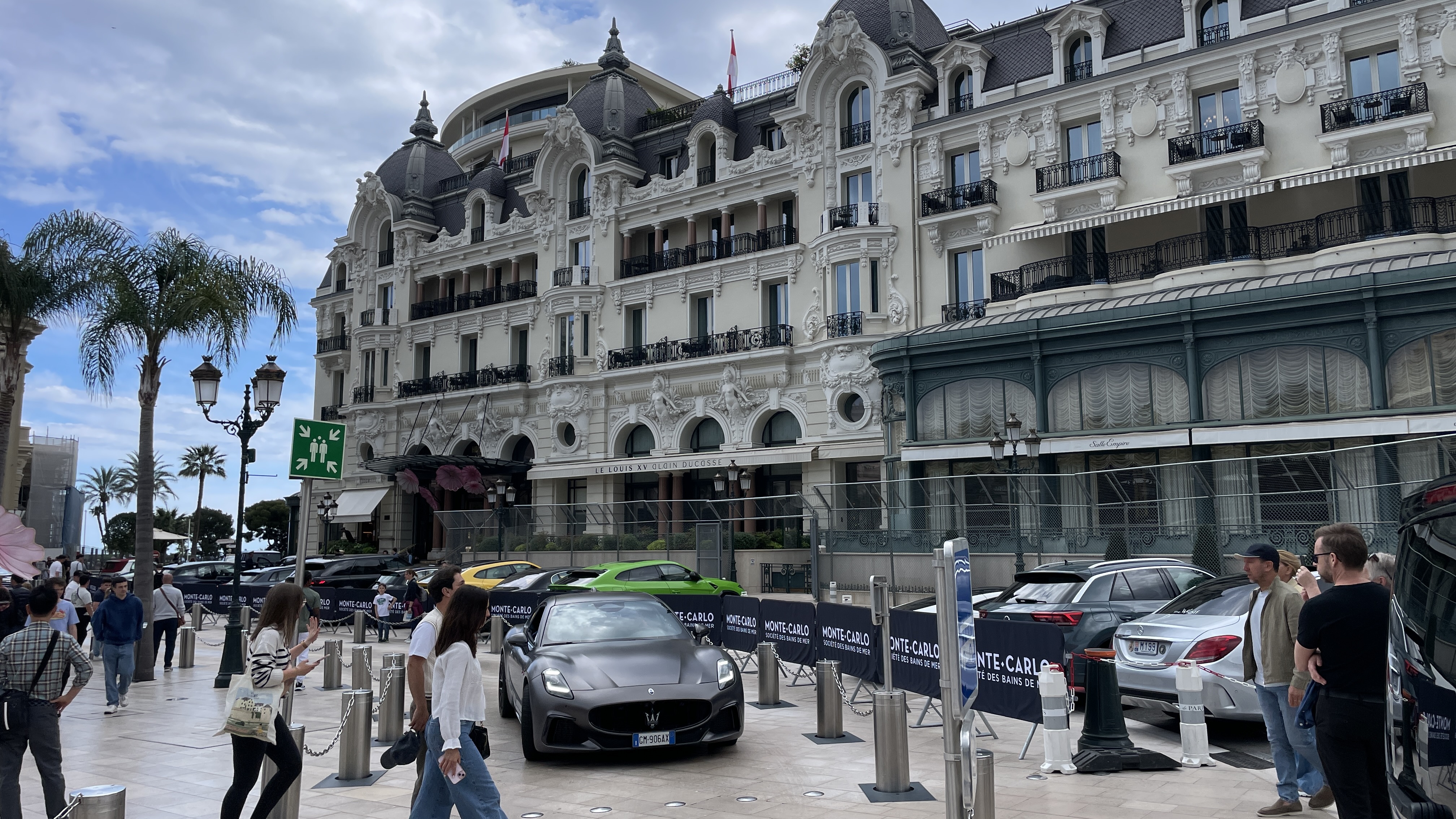 Monte Carlo luxury yacht marina with mountain backdrop
